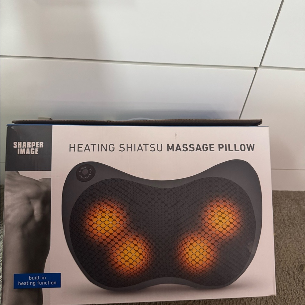 Sharper Image Black and Orange Massage Pillow